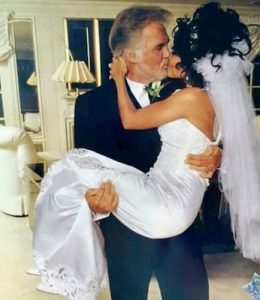 Kenny Rogers and Miller during their wedding 
